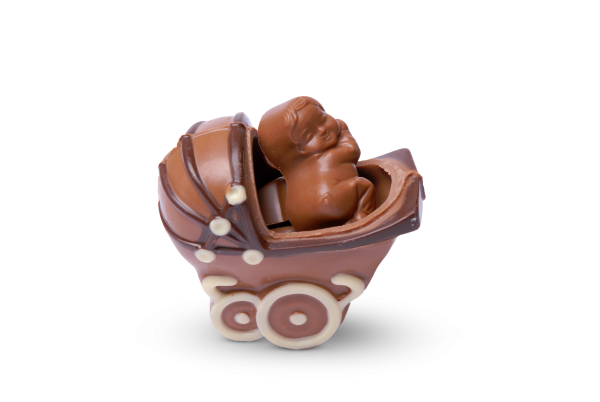 Schokoladen-Puppenwagen gefüllt mit Pralinen