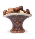 Schokoladen-Körbchen mit Gesicht gefüllt mit Pralinen
